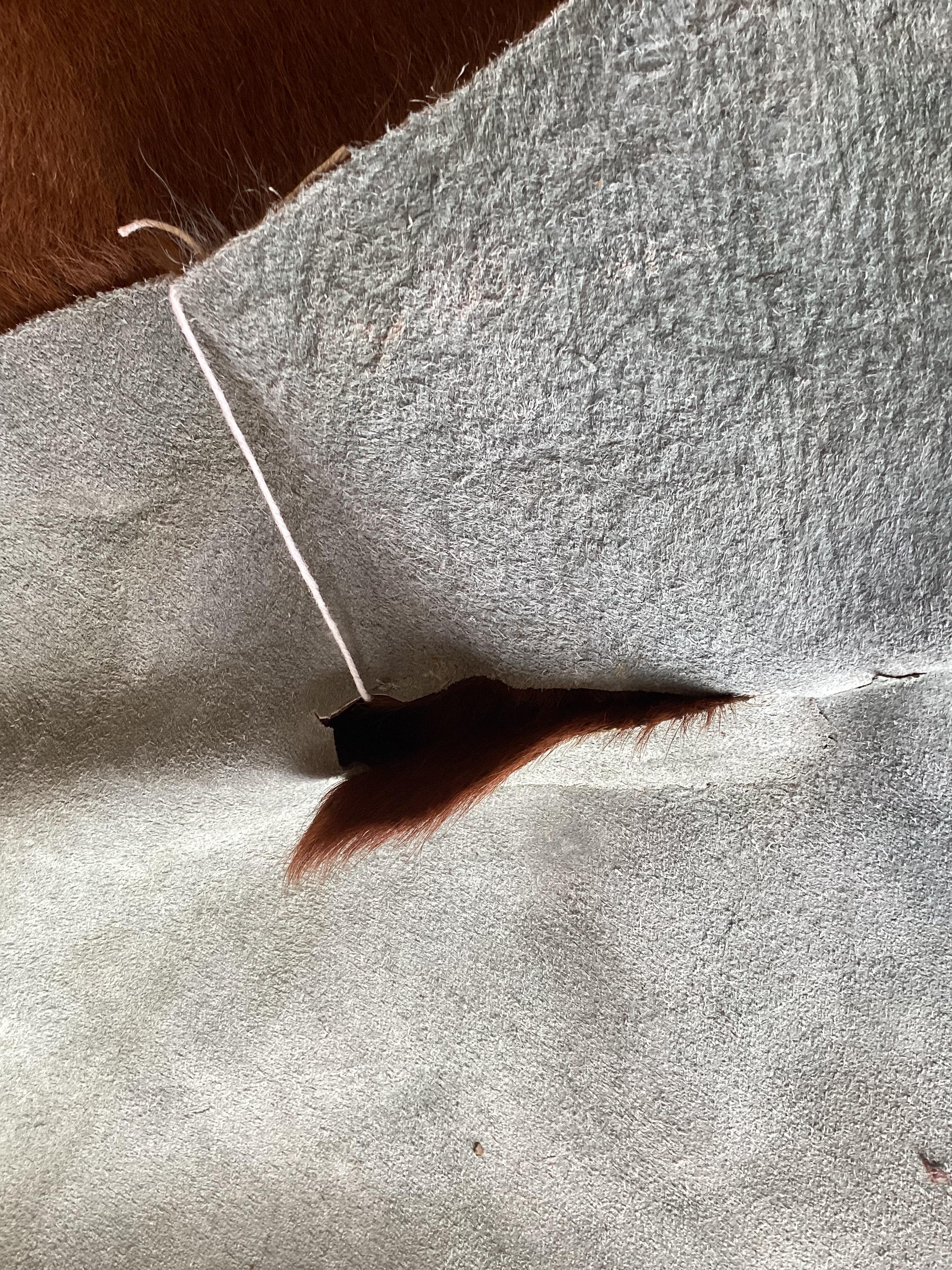 A cow skin rug, approx. 180 x 160cm